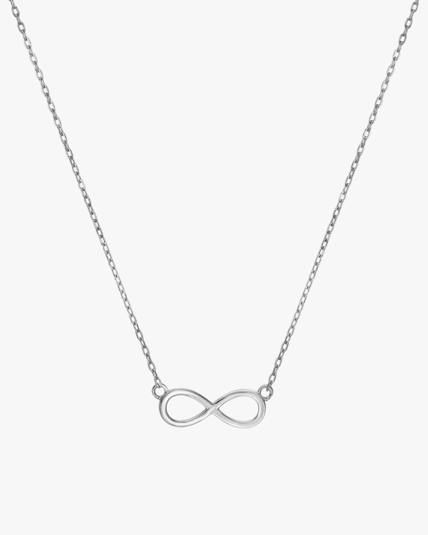 Colgantes pequeños de plata lisa diseño infinito