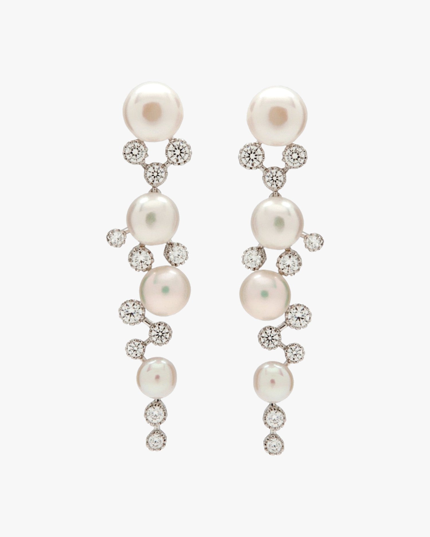 Pendientes largos diseño combinado de perlas y circonitas