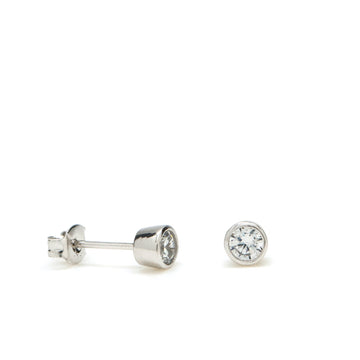 Pendientes botón diseño de circonita y plata lisa