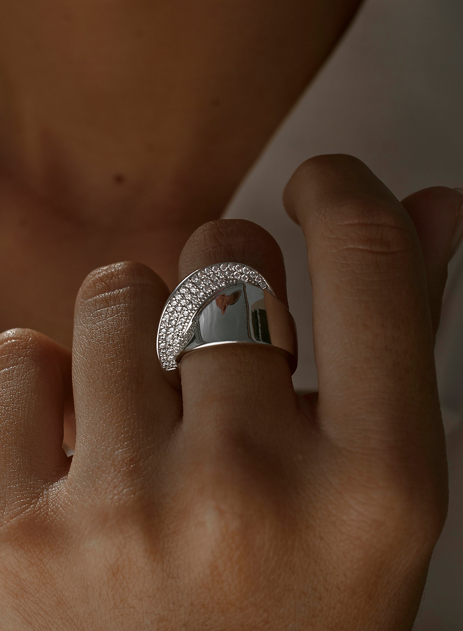 Large cross-style rings with cubic zirconia