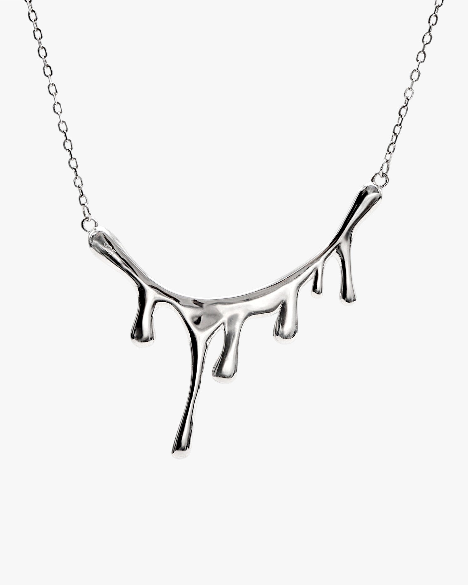 Original silver necklaces with a drip design