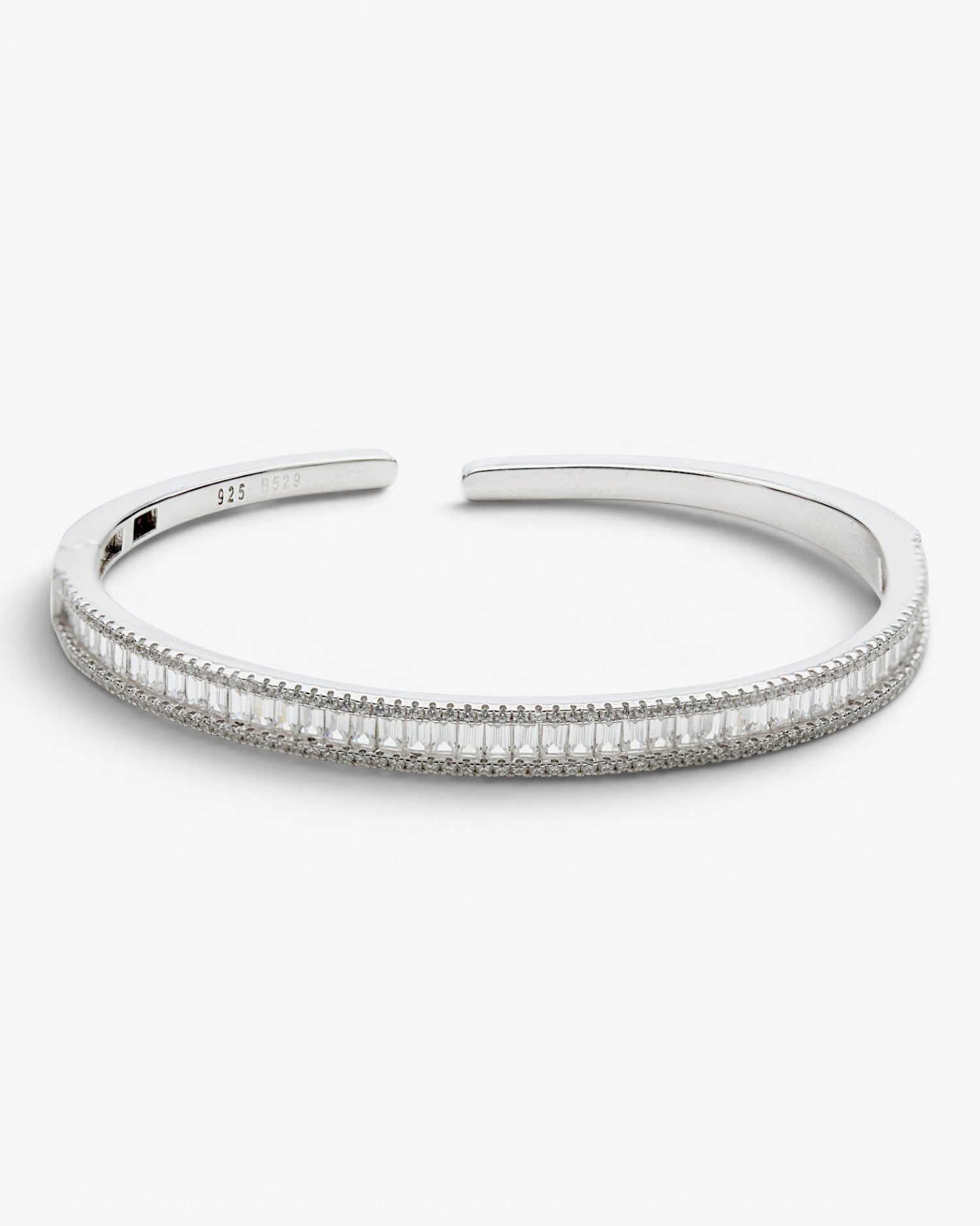 Pulsera esclava de plata raíl con engaste de circonita