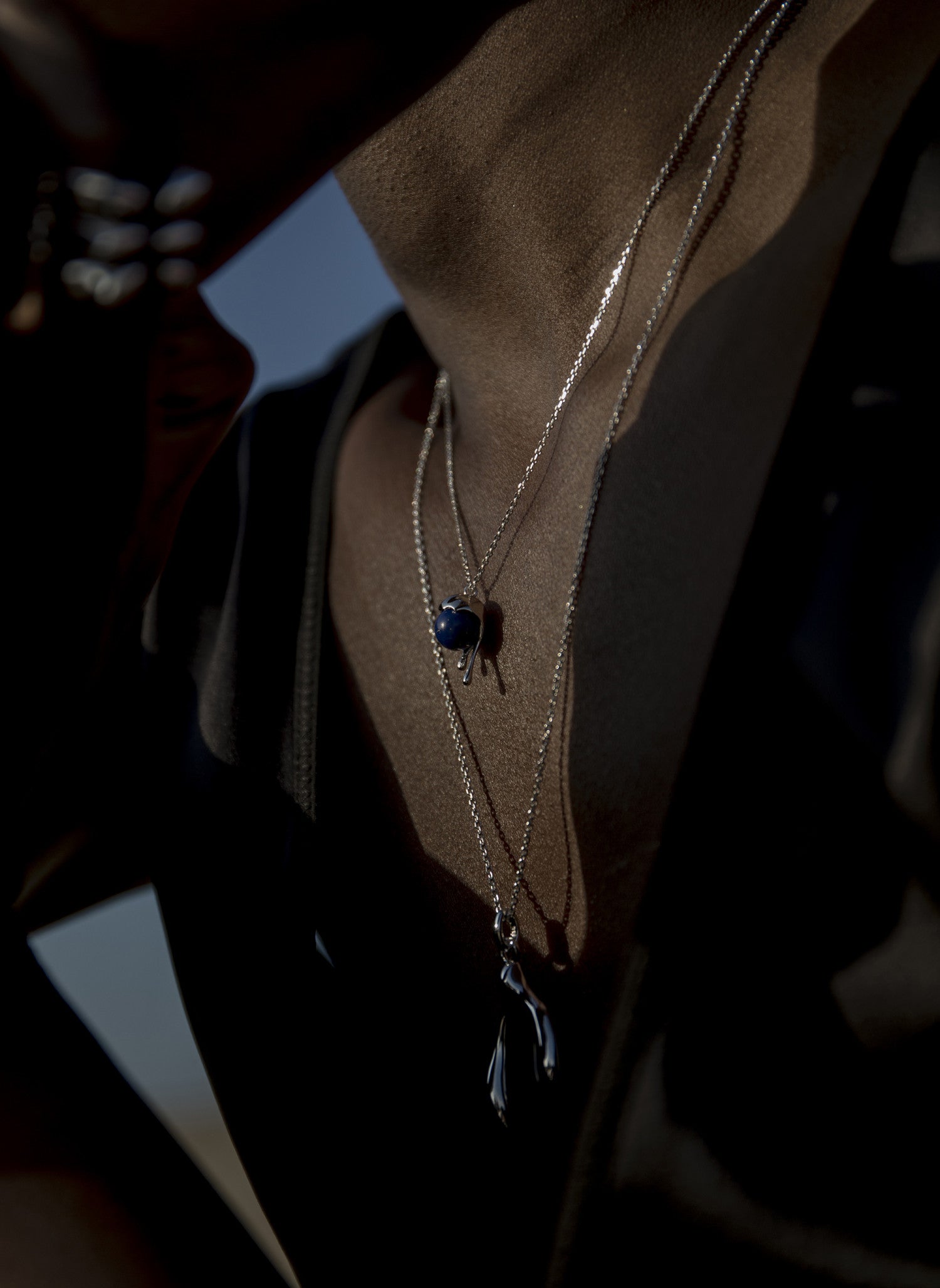 Original silver necklaces for women with a double teardrop design