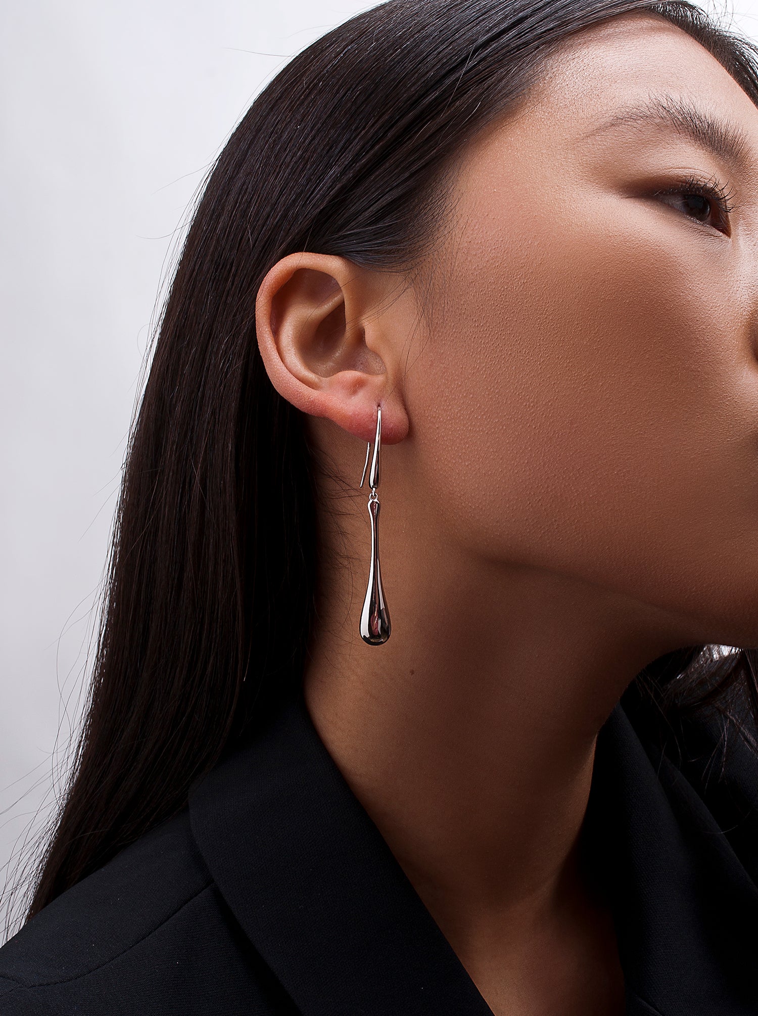 Original long teardrop-shaped silver earrings