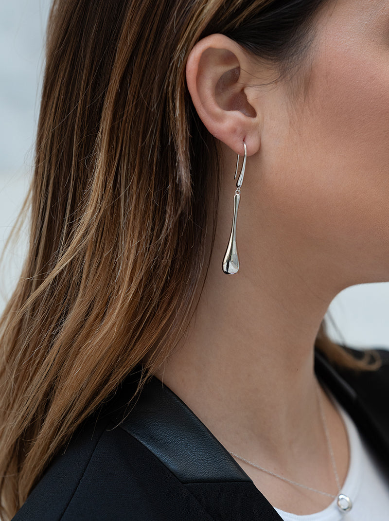 Original long teardrop-shaped silver earrings