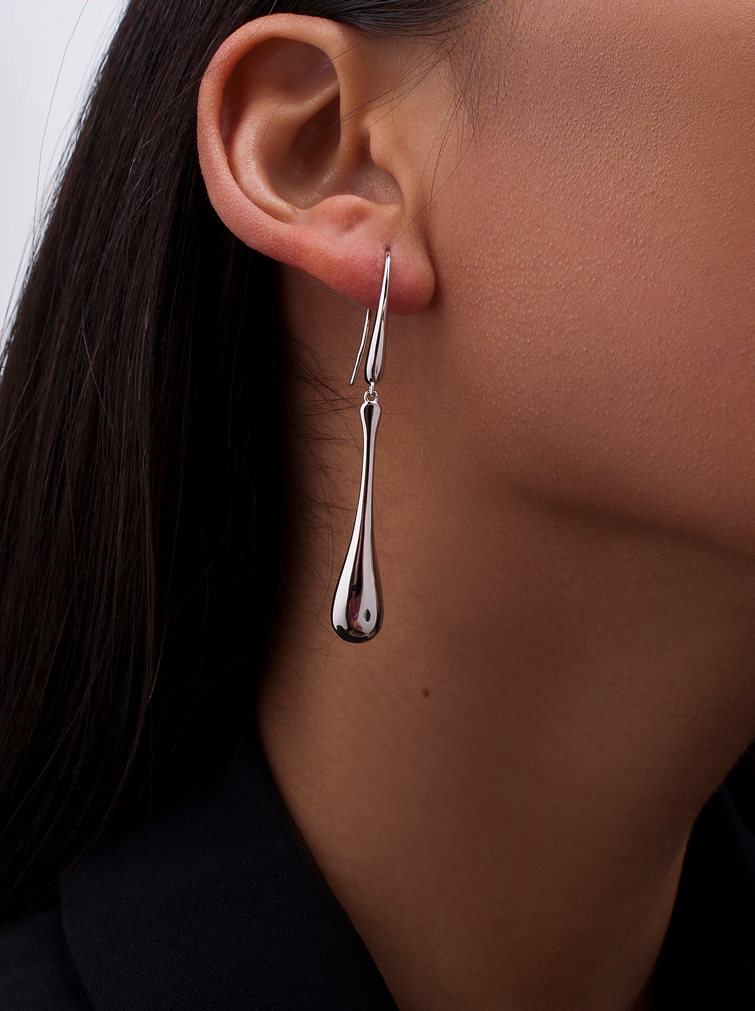 Original long teardrop-shaped silver earrings