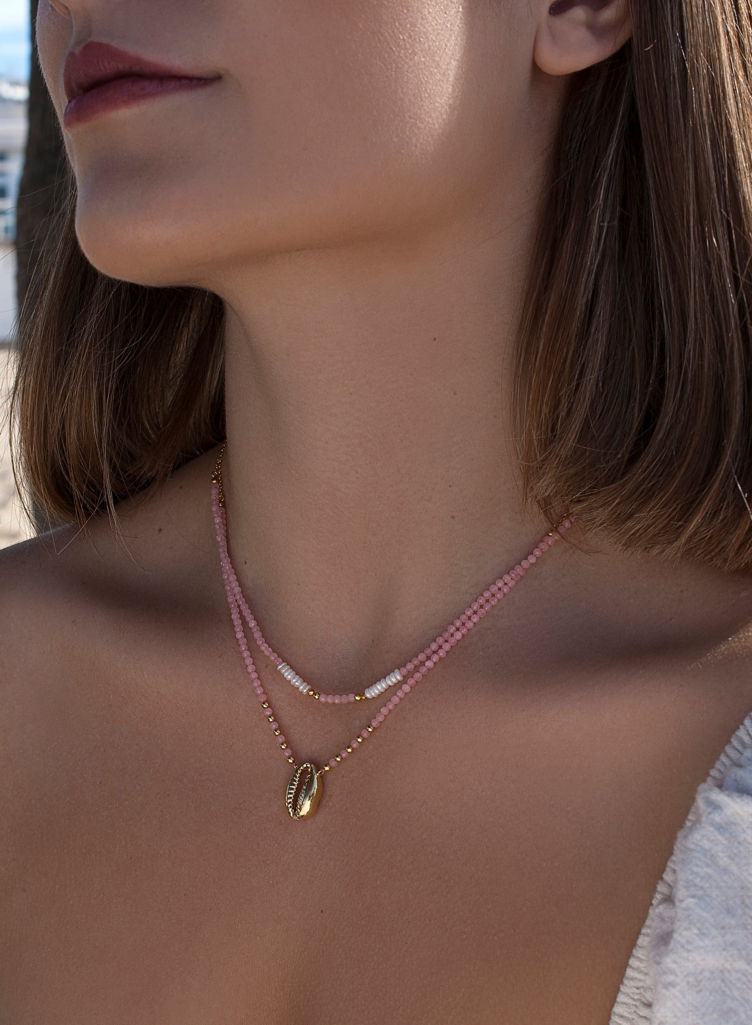 Collares dobles diseño de abalorios y charm de concha