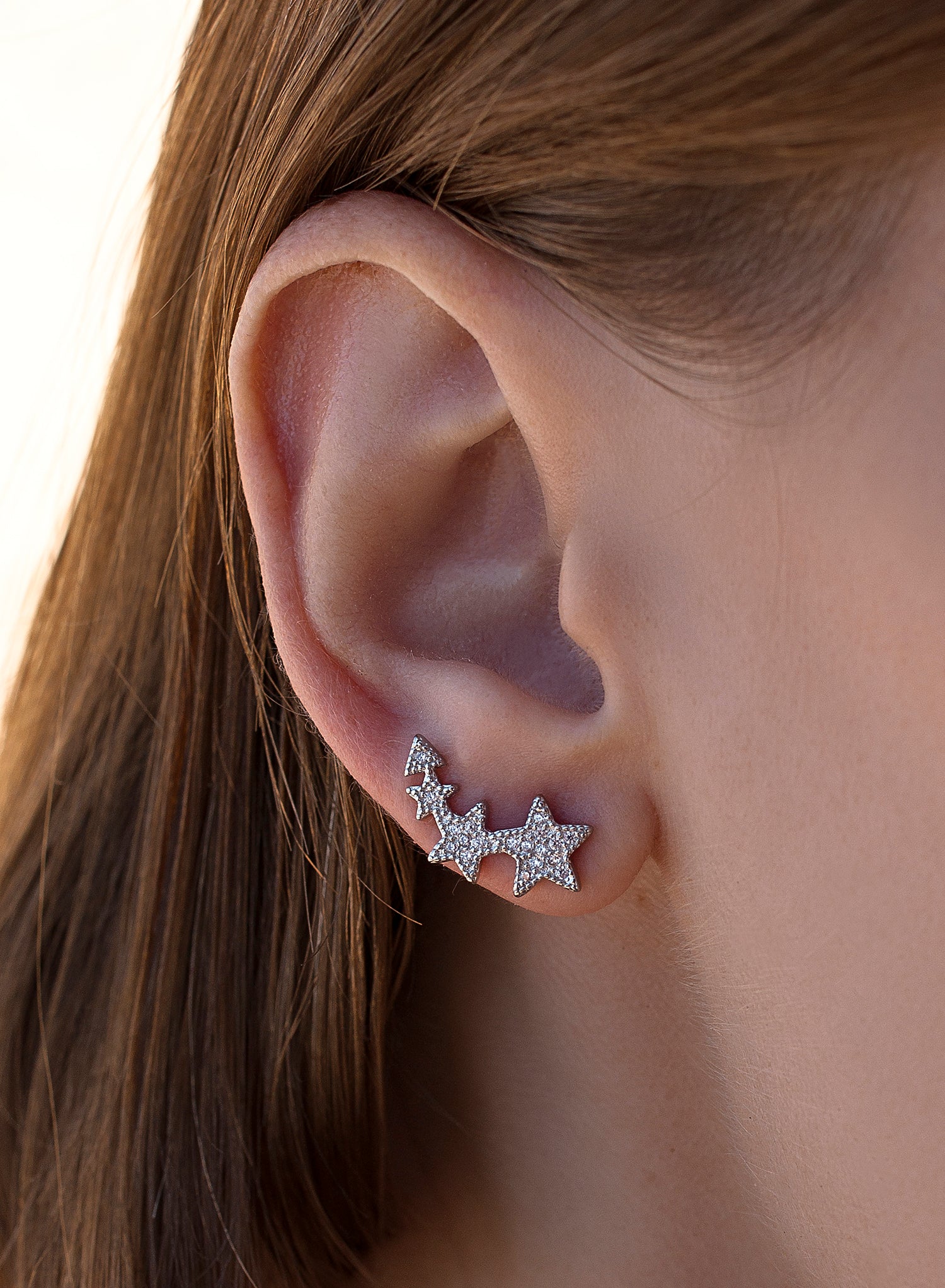 Pendientes trepadores de plata diseño estrella ascendiente