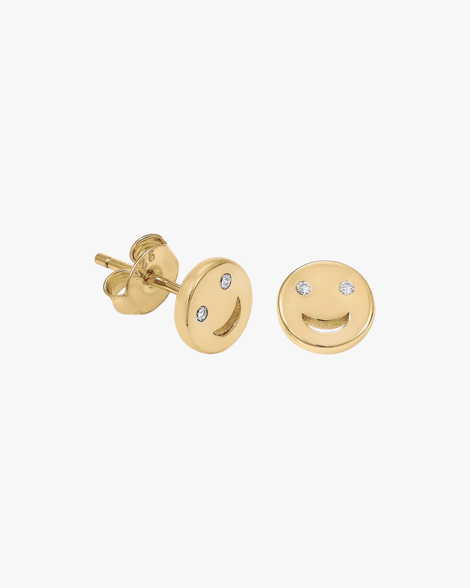 Small earrings in plain silver with a smile design