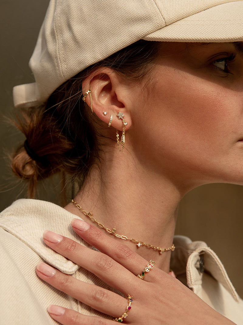 Ear cuff de plata bañada en oro diseño doble cadena colgante