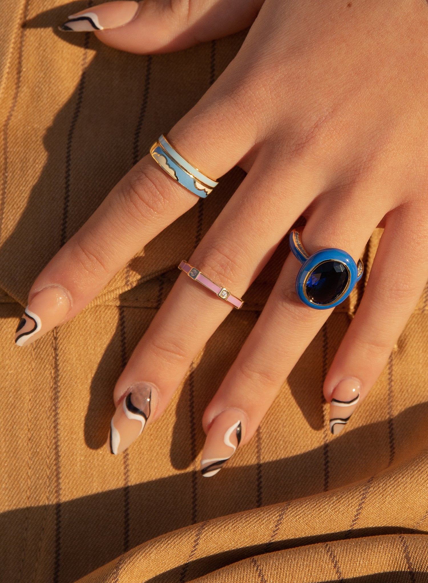 Fine silver rings with sky blue enamel design