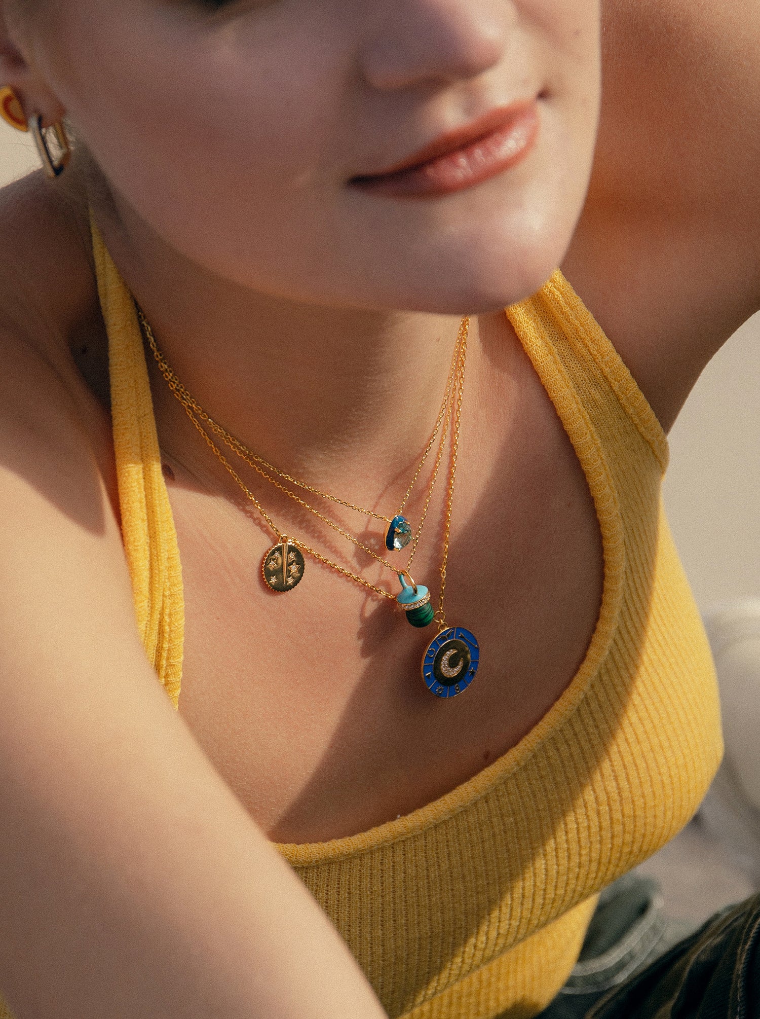 Silver necklace with gold plated medallion design and enamel