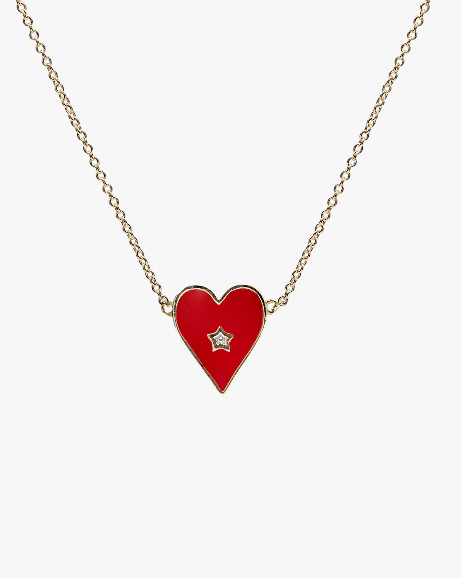 Small heart-shaped pendants with red enamel