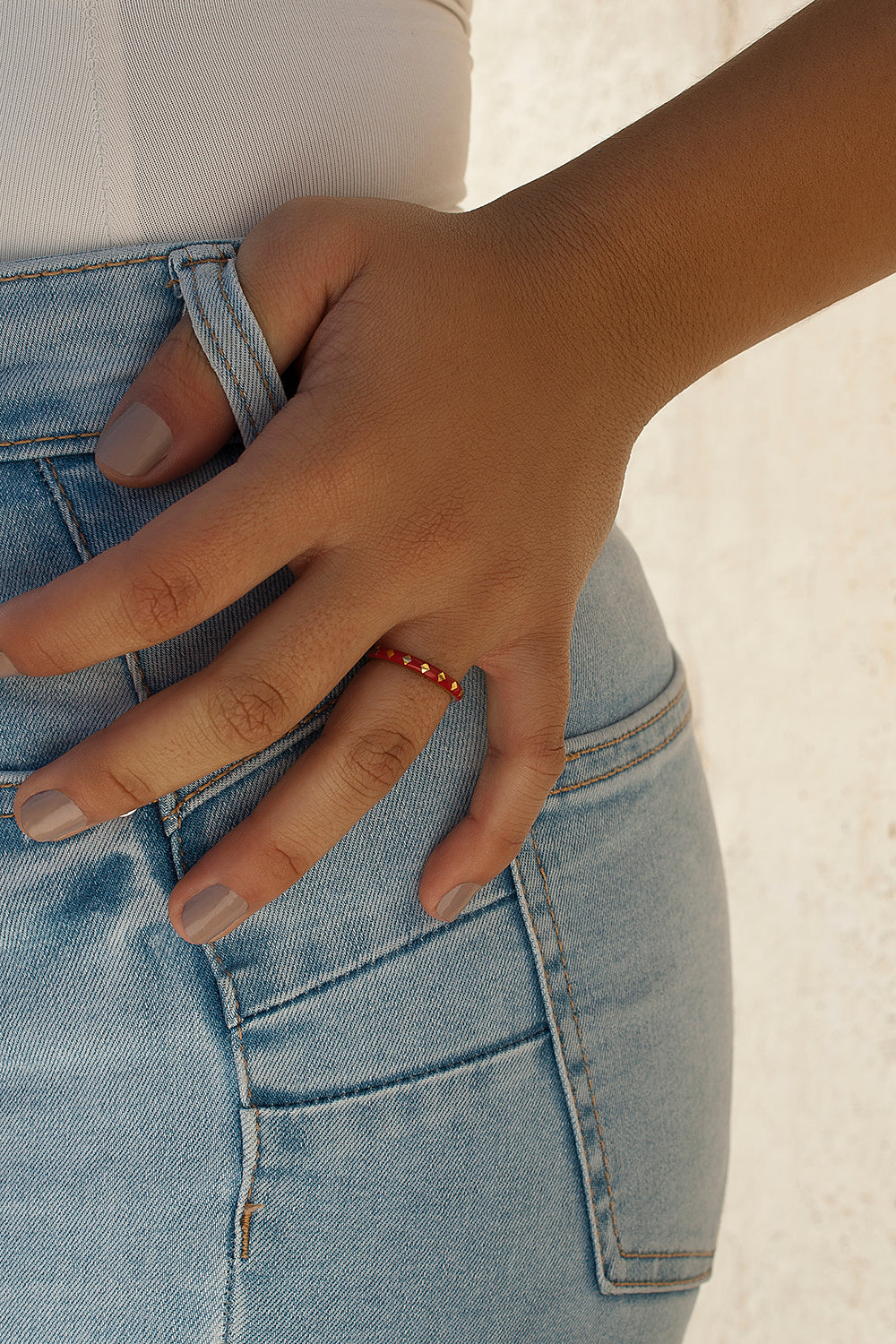 Thin rings with a diamond border design and red enamel