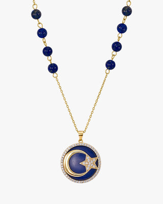 Collier orné d'un motif central représentant une lune et une étoile, serti de zirconiums cubiques.