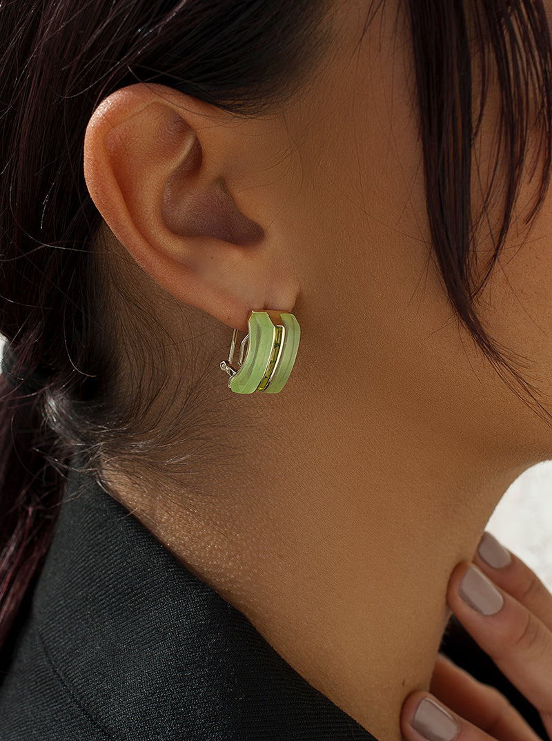 Omega clasp earrings, resin design and green gems