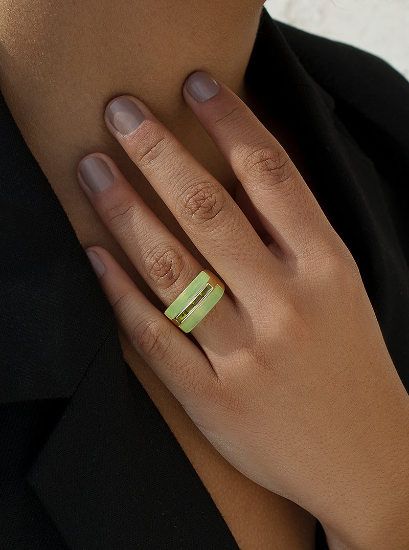 Designer rings with resin and green gems