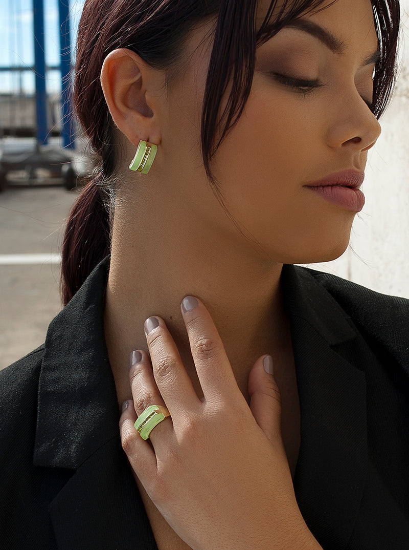 Designer rings with resin and green gems