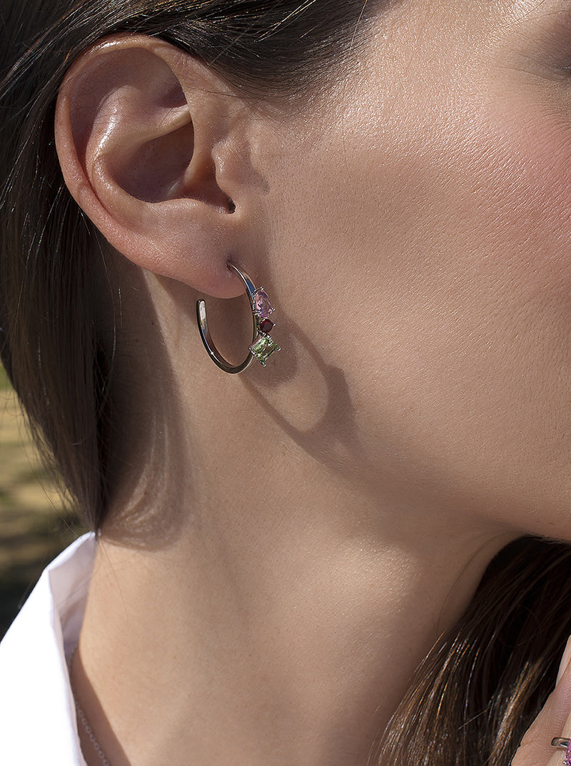 Hoop earrings with stones, design of three adamantine quartz