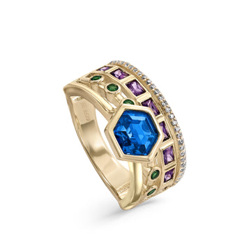 Rings with hexagonal central stone motif in a blue tone