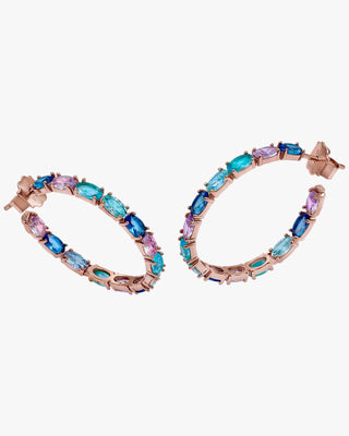 Hoop earrings with oval-cut stones in shades of blue