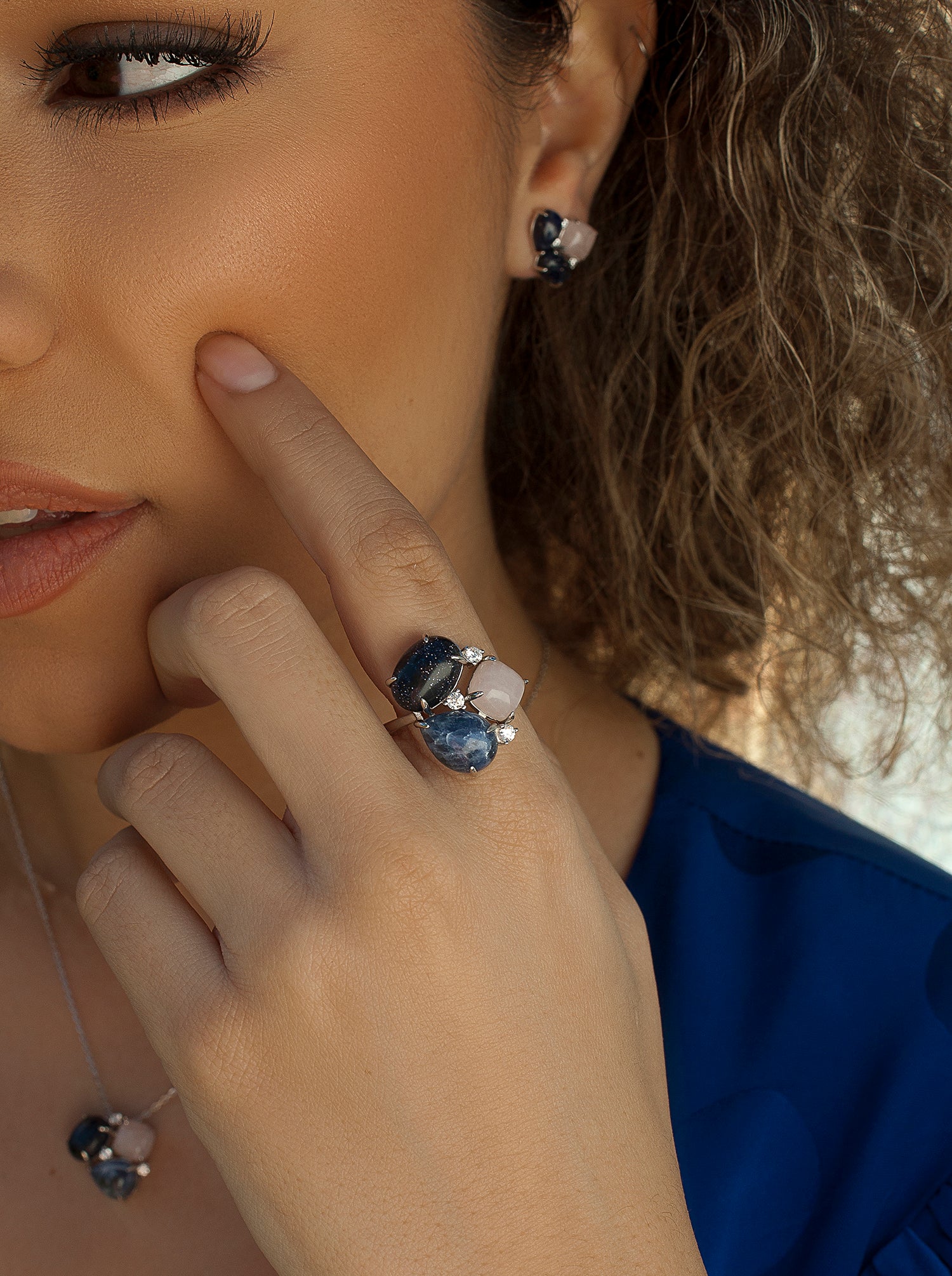 Rings with blue-toned stones and cubic zirconia