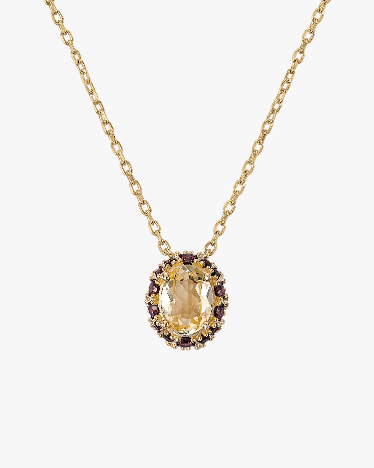 Collares con piedras motivo central en tonos amarillos y granates