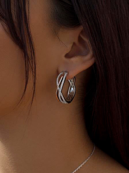 Original hoop earrings with a two-tone channel design and cubic zirconia