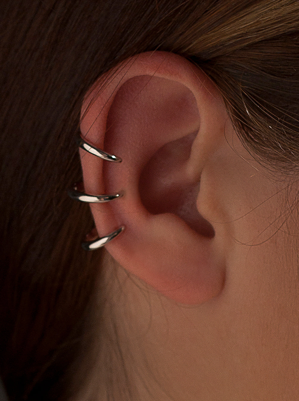 Ear cuff formado por tres aros en plata lisa