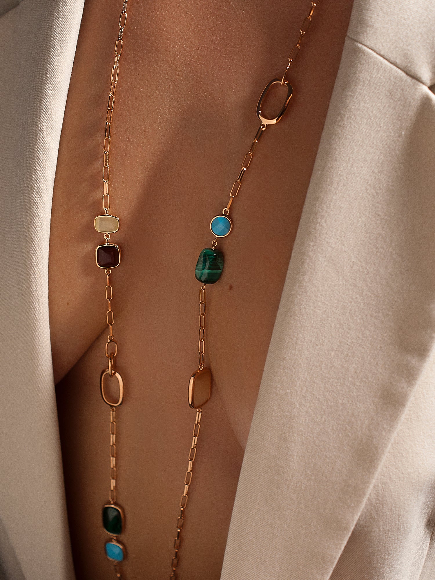 Long necklaces with designer stones in autumn tones