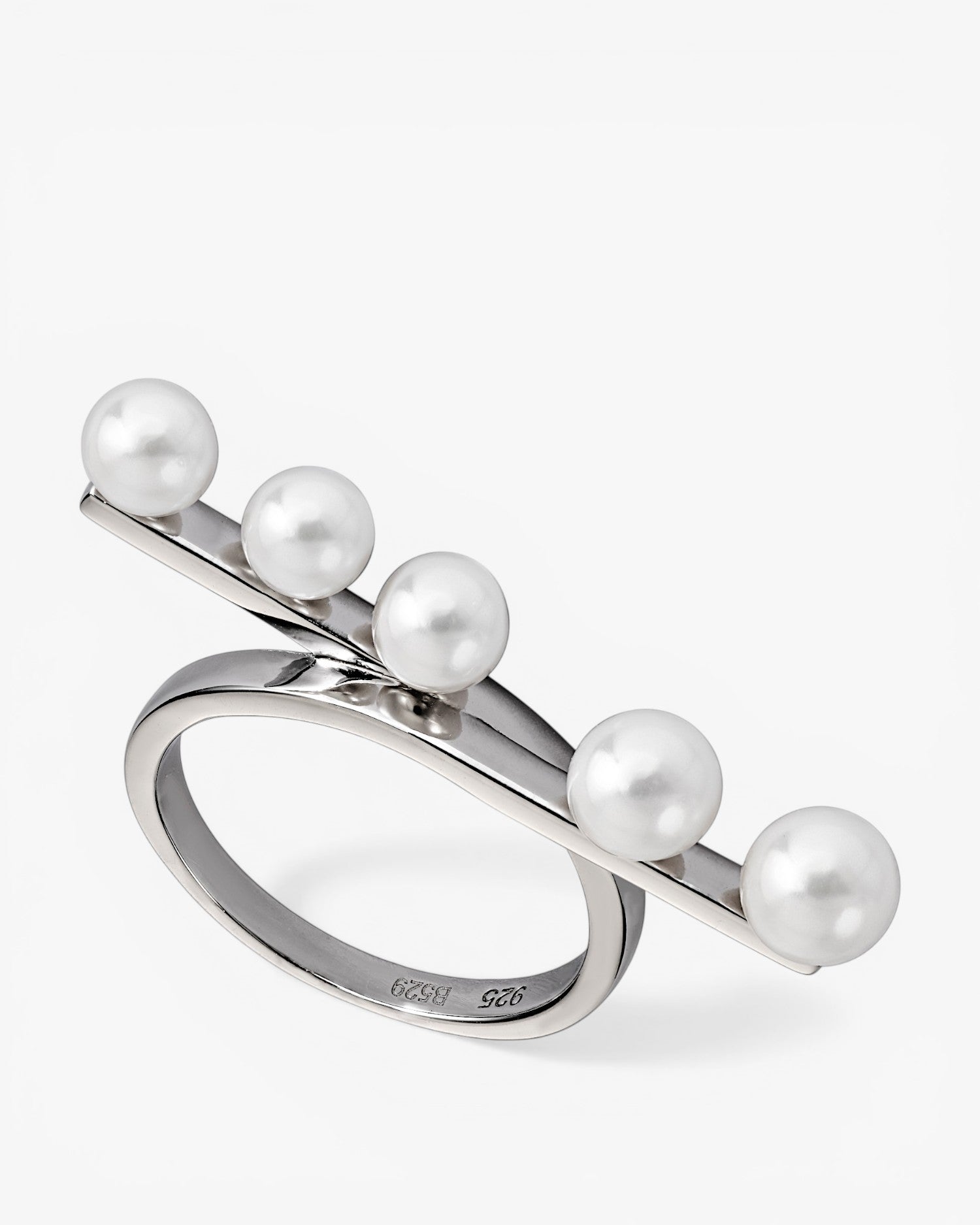 Minimalist design pearl rings