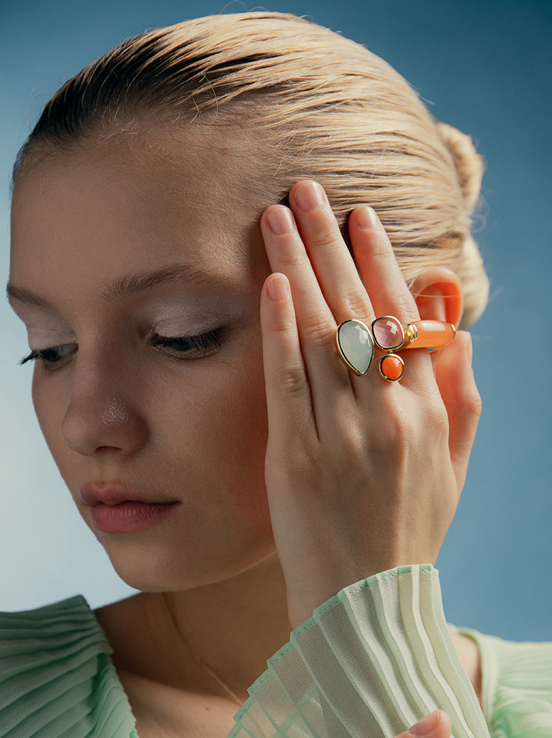 Rings with rose quartz teardrop design stones