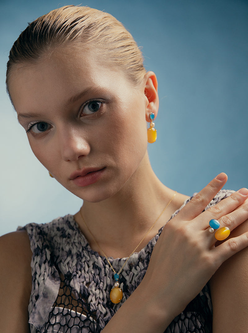 Rings with open design stones in citrine tone
