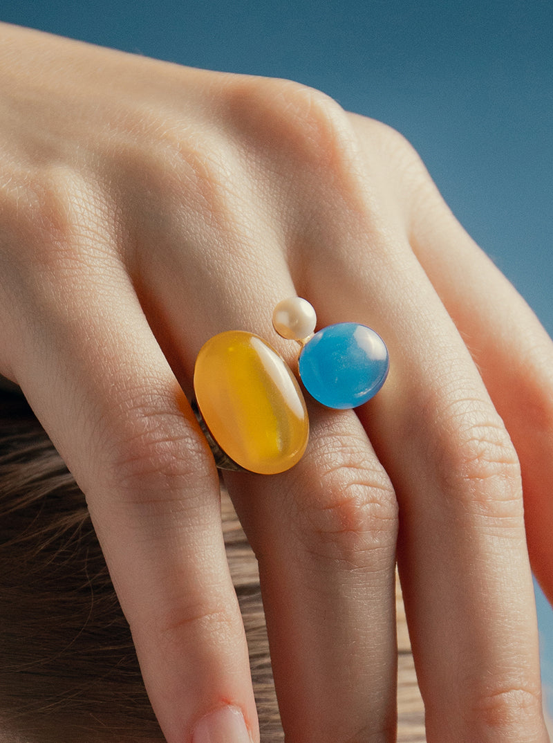 Rings with open design stones in citrine tone