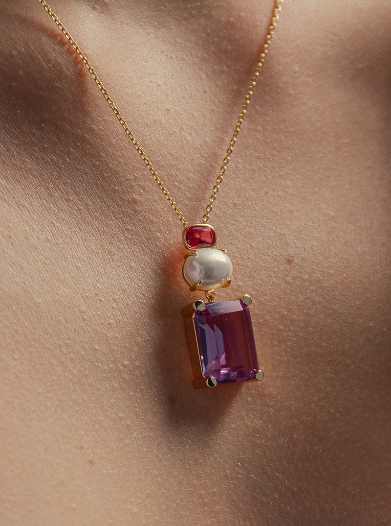 Necklaces with geometric design stones in shades of purple