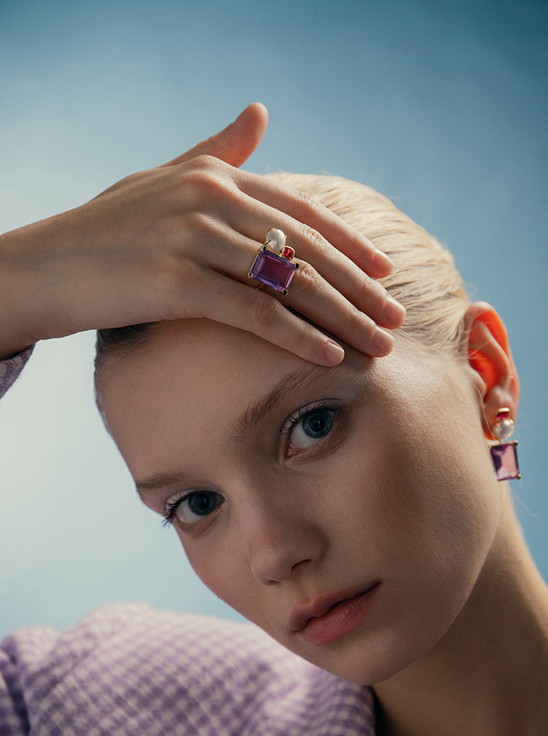 Rings with geometric design stones in shades of purple