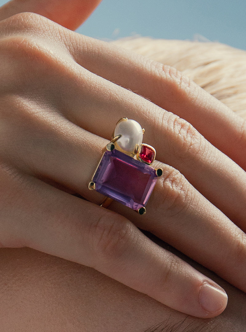 Rings with geometric design stones in shades of purple