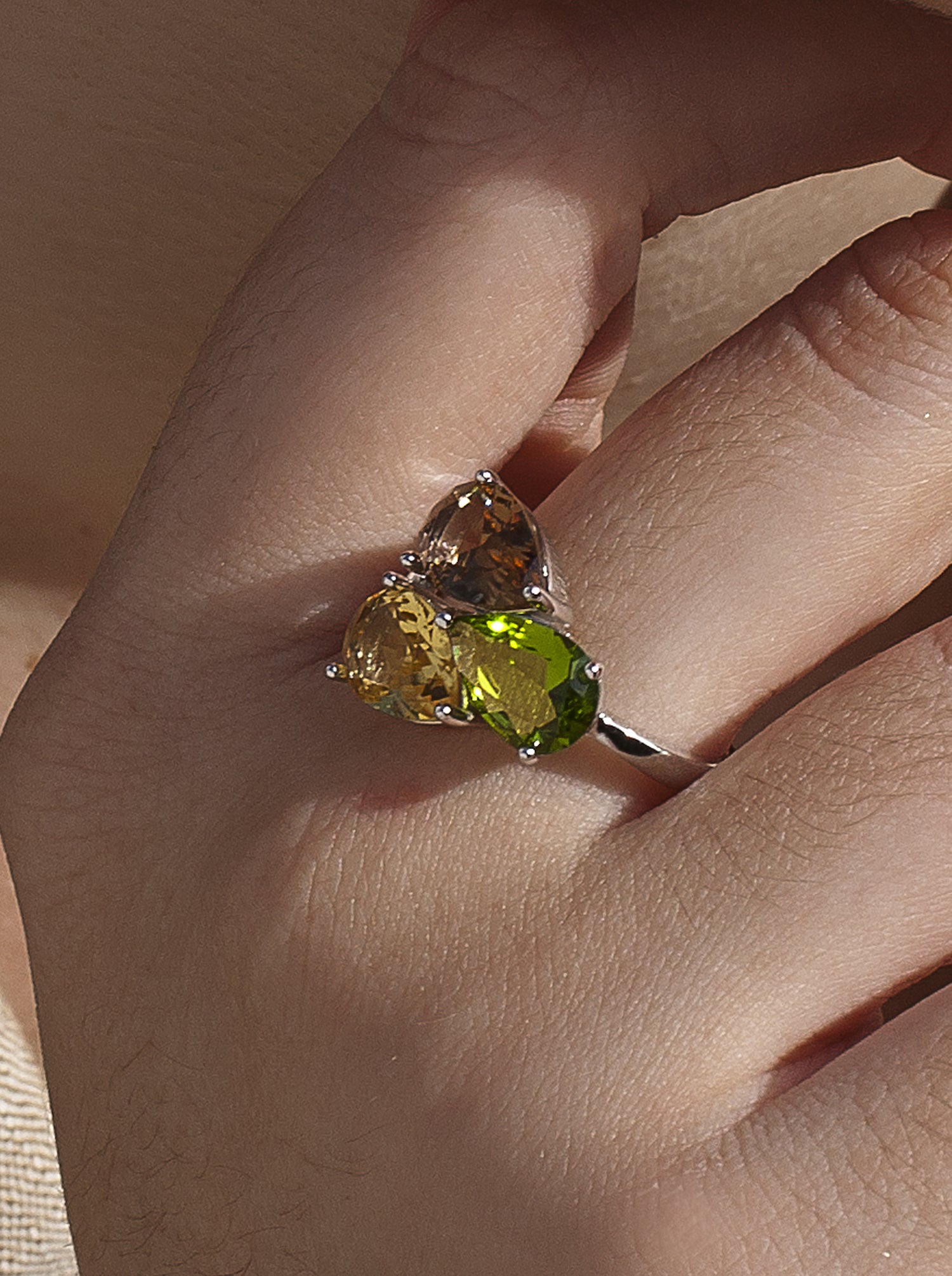 Rings with three-gem design stones in a natural tone