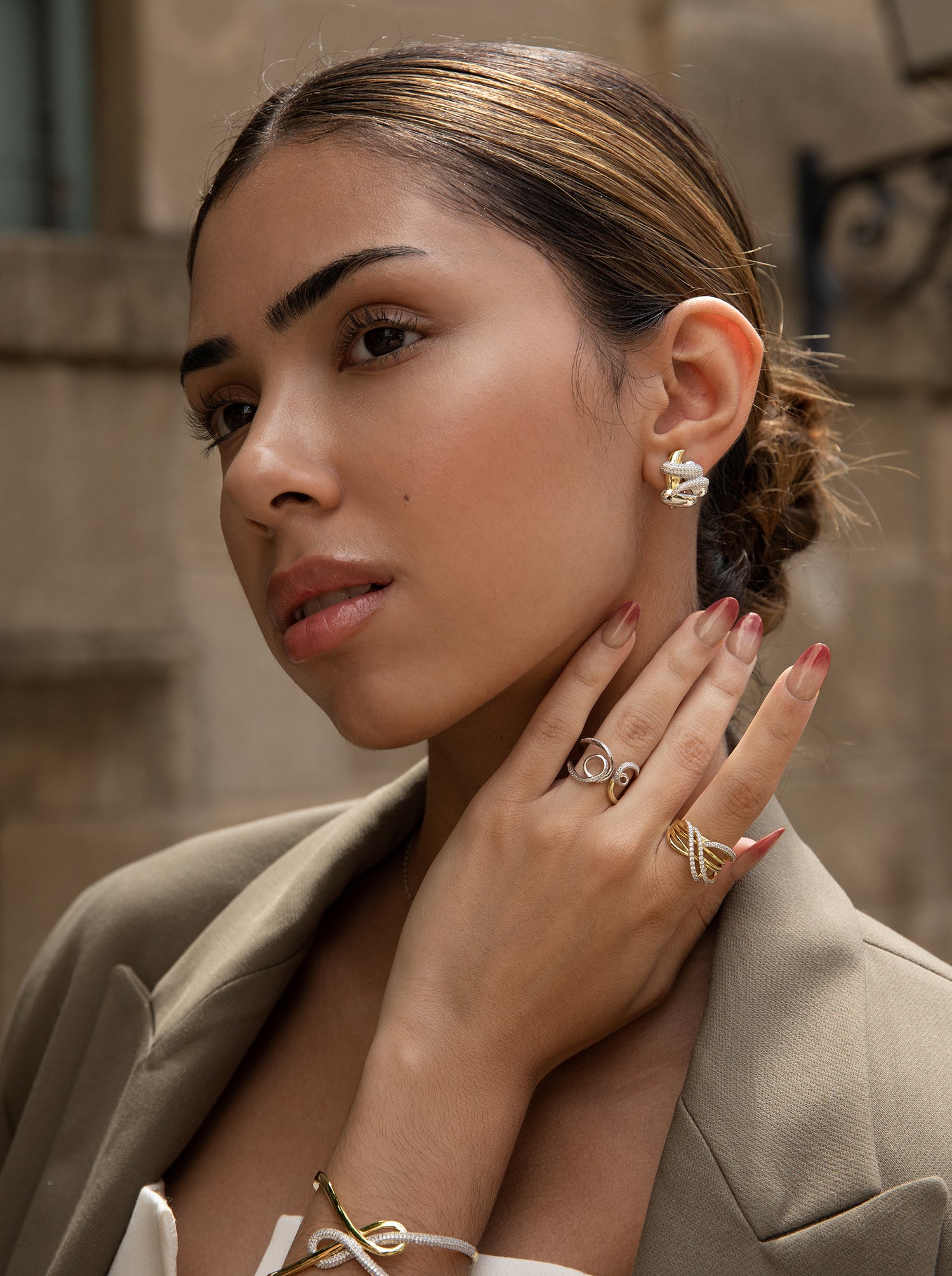 Anillos bicolor de plata diseño tirabuzones con circonitas