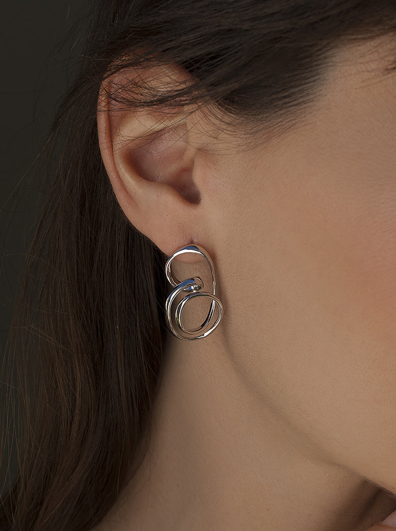 Original silver earrings with an intertwined design