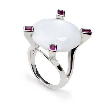 Rings with faceted stones in white and fuchsia tones