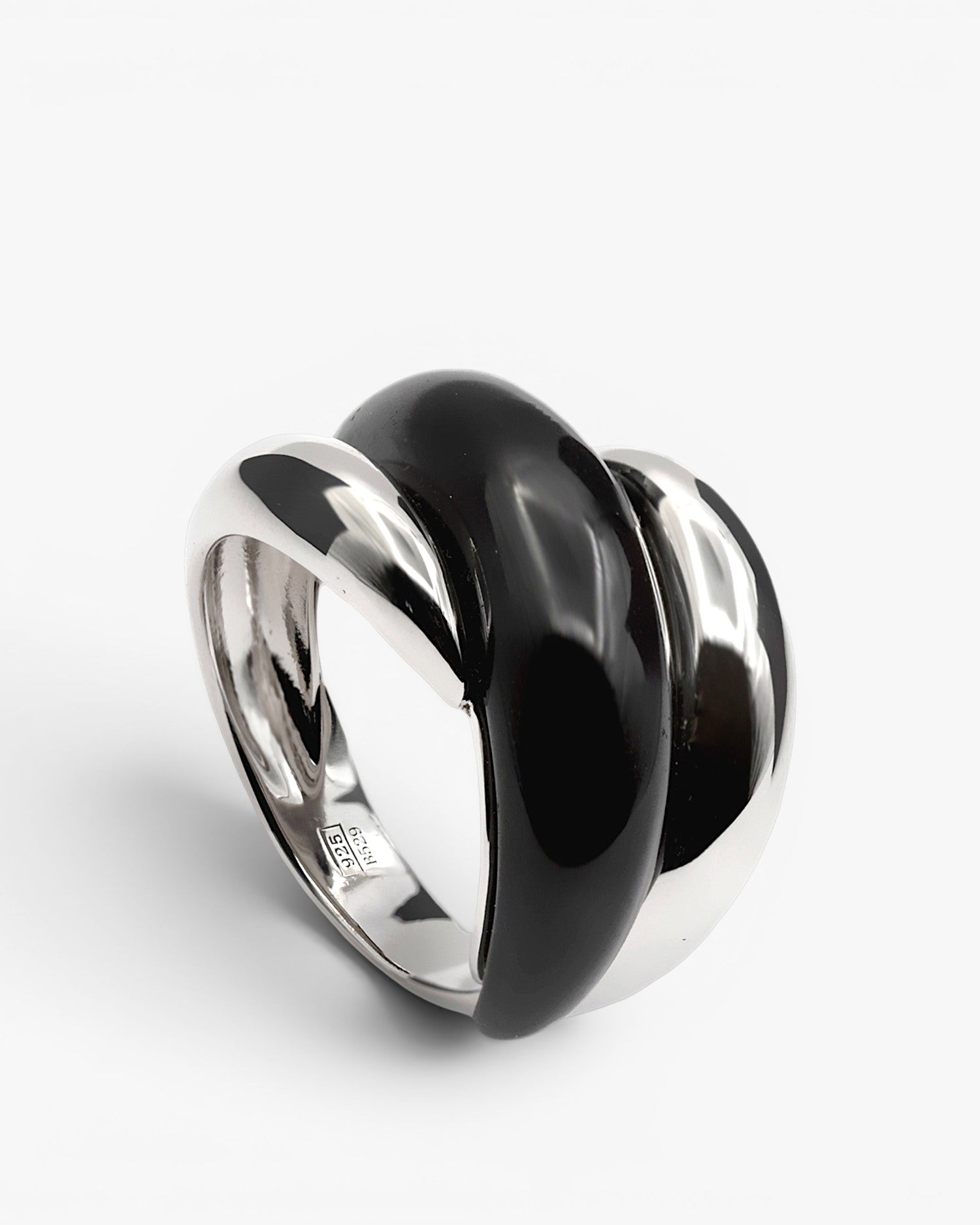 Rings with avant-garde design stones in black tones