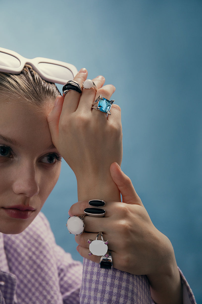 Rings with elegantly designed stones in black tones