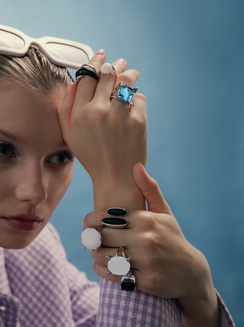 Rings with minimalist design stones in a white tone