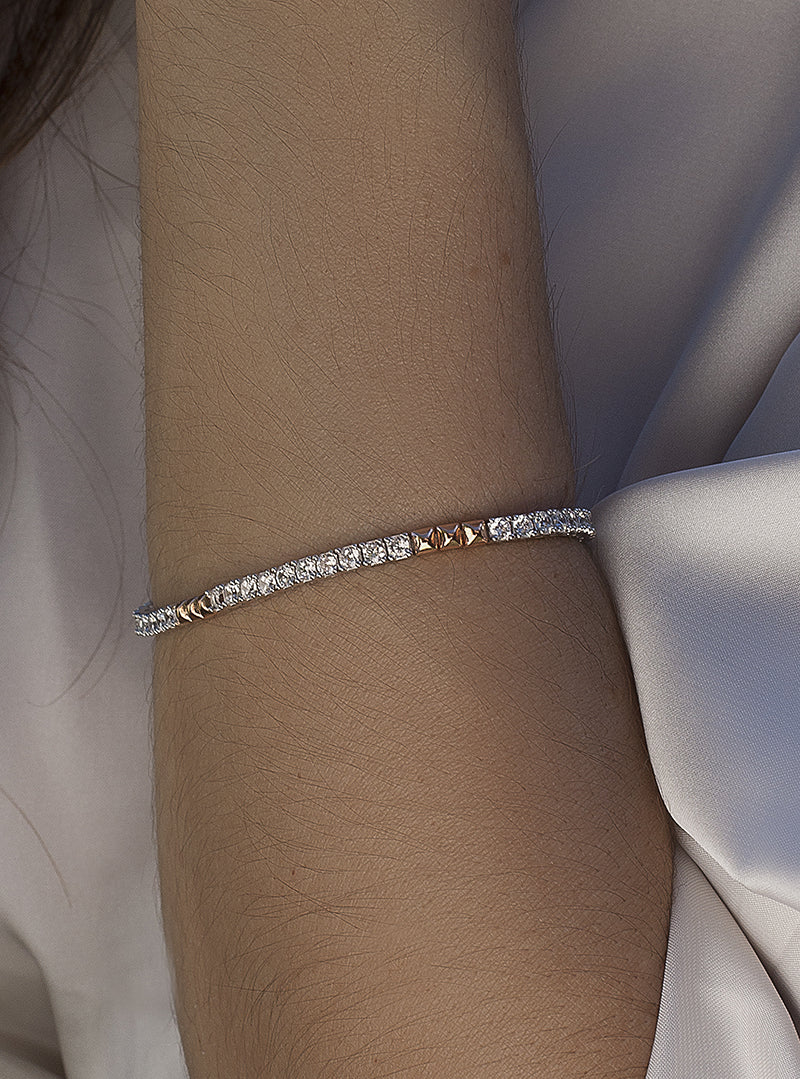 bracelet riviere bicolore en rose et zircon taille princesse combinee