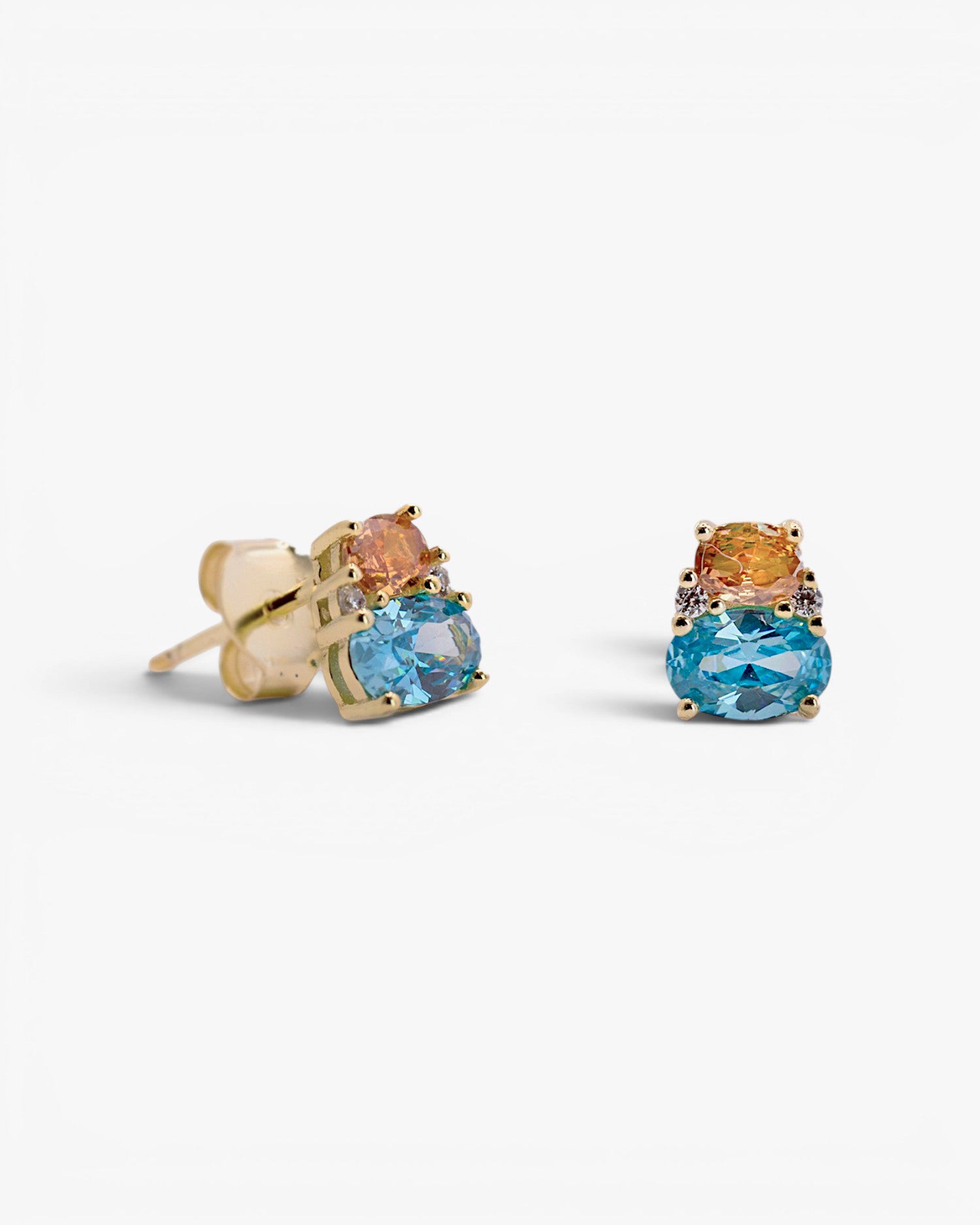 Small earrings with aquamarine and orange gemstones