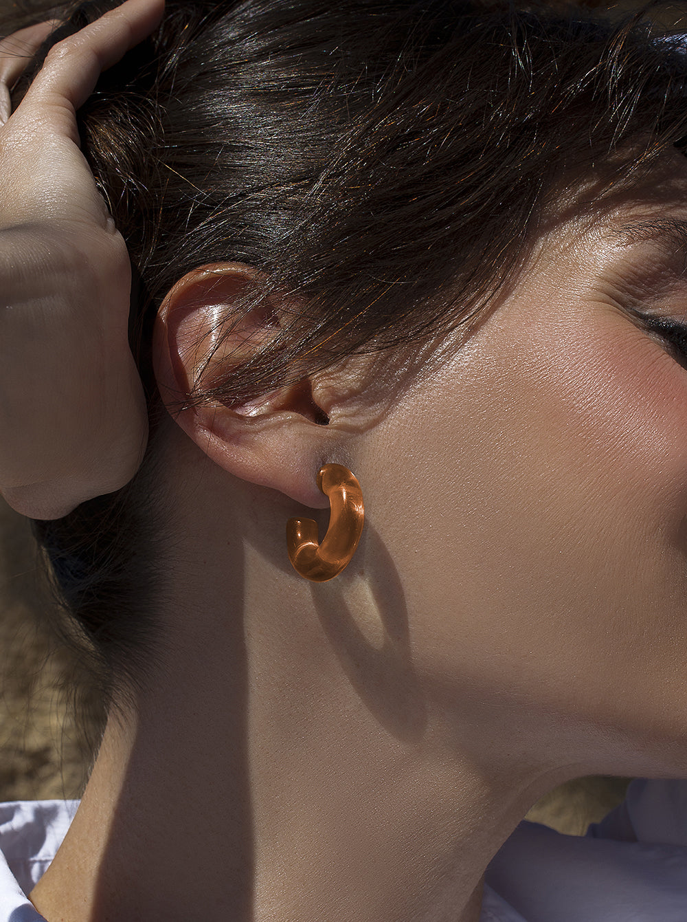 Original hoop earrings in orange tones