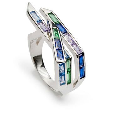Anillo con piedras tono azul estilo geométrico