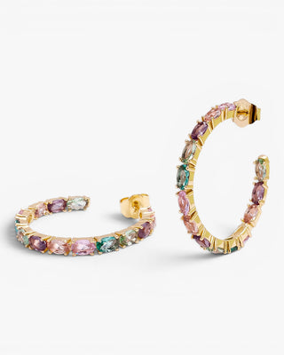 Boucles d'oreilles créoles en argent ornées de pierres ovales roses