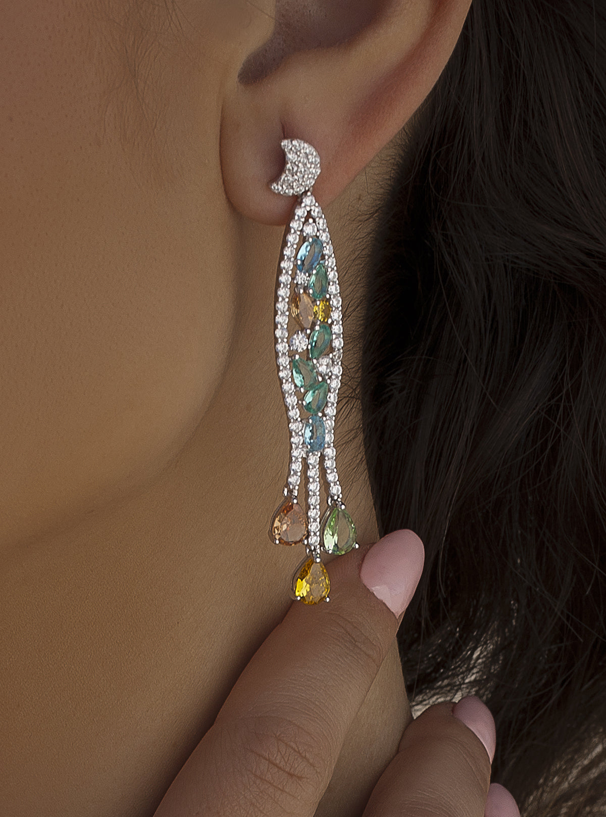 Long baroque-style earrings with stones in cool tones